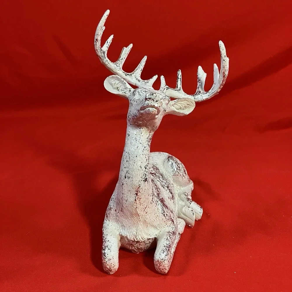 December Home reindeer laying